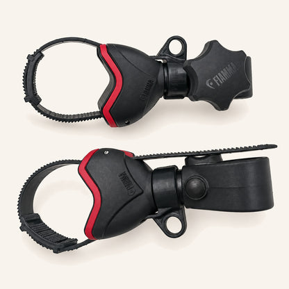 Two Fiamma bike frame clamps with red protective pads, adjustable straps and mounting fittings